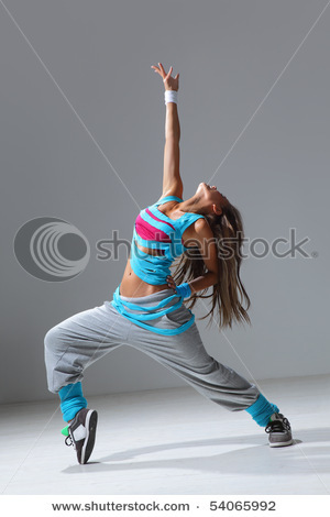 stock-photo--hip-hop-style-dancer-posing-on-studio-background-54065992