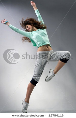 stock-photo-modern-ballet-dancer-dancing-on-the-grey-studio-background-12794116