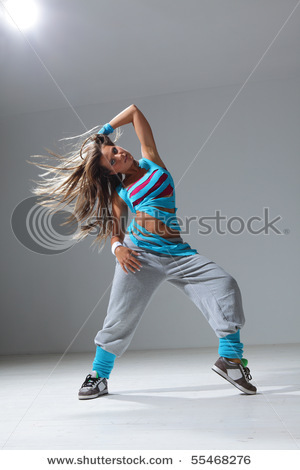 stock-photo-modern-style-dancer-posing-on-studio-background-55468276