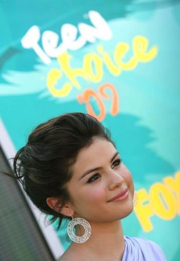 Selena-Gomez-308069,400693,big - poze Selena Gomez