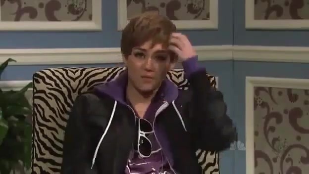 Miley Cyrus  as Justin Bieber  SNL 0679 - 0-0 Miley Cyrus as Justin Bieber  SNL