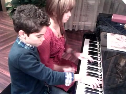 Debby Ryan gives Cameron a quick piano lesson 143