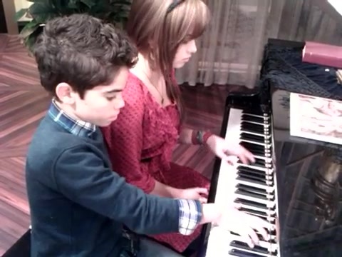 Debby Ryan gives Cameron a quick piano lesson 147