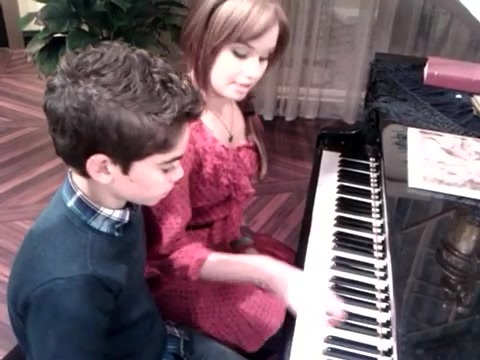 Debby Ryan gives Cameron a quick piano lesson 161