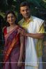 33163-a-still-image-of-anupam-bhattacharya-and-payal-nair