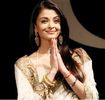 Aishwarya Rai in her gold traditional Indian fashion