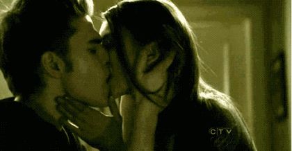 ; *o saruta mai apasat si o pune pe pat,isi da si el tricoul jos*