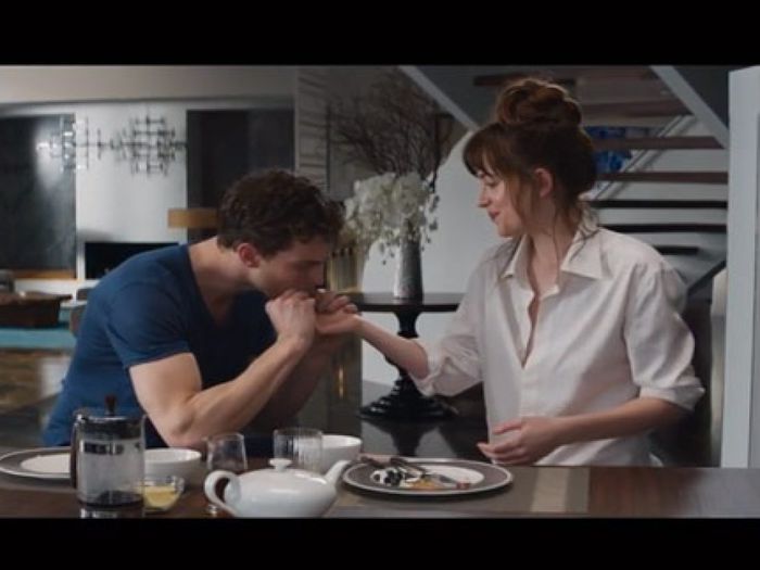 fifty-shades-of-grey-christian-eats-out-of-anastasia-hand-ftr