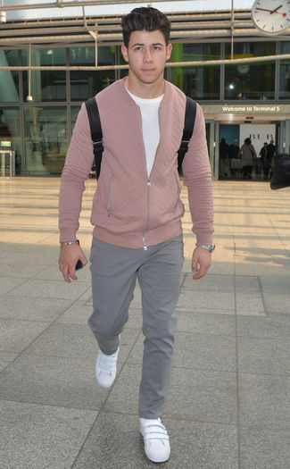 Hunky-crooner-Nick-Jonas-was-casual-and-chic-at-Heathrow-Airport-in-Londond. - nick jonas