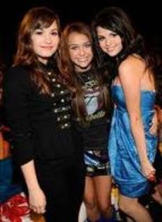 demi  lovato  and  miley  cyrus and selena gomez