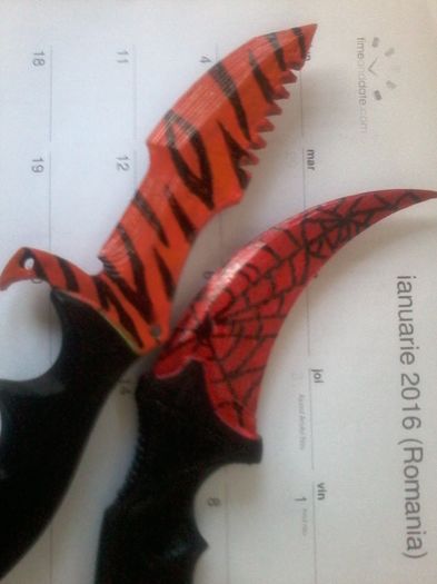 huntsman si karambit; huntsman tiger si karambit crimson
75lei/buc
