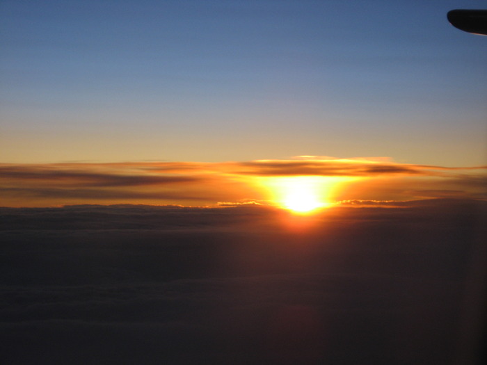 apus de soare vazut din avion