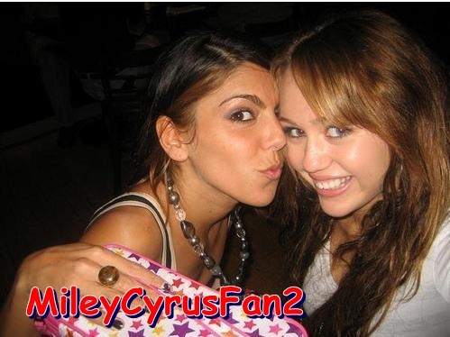 8 - Miley Cyrus and her friend