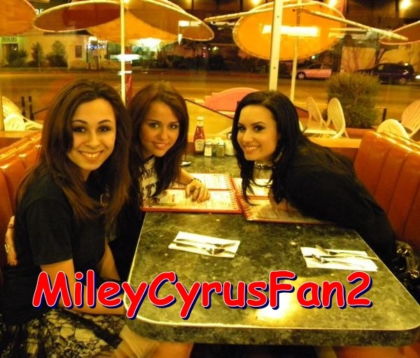 9 - Miley Cyrus and her friend