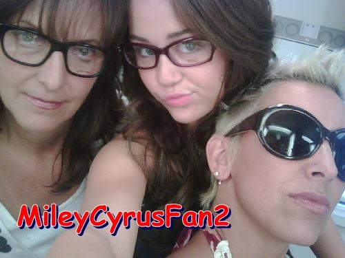 11 - Miley Cyrus and her friend
