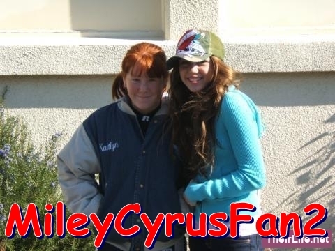 12 - Miley Cyrus and her friend