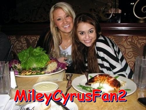 SHXCKFHXRGGTREXSTQD - Miley Cyrus and her friend
