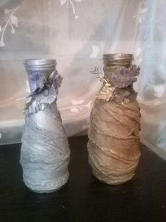 005; din sticle de vin .. am realizat niste vaze ..
