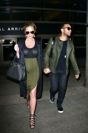 Chrissy-Teigen-and-John-Legend-are-seen-at-LAX