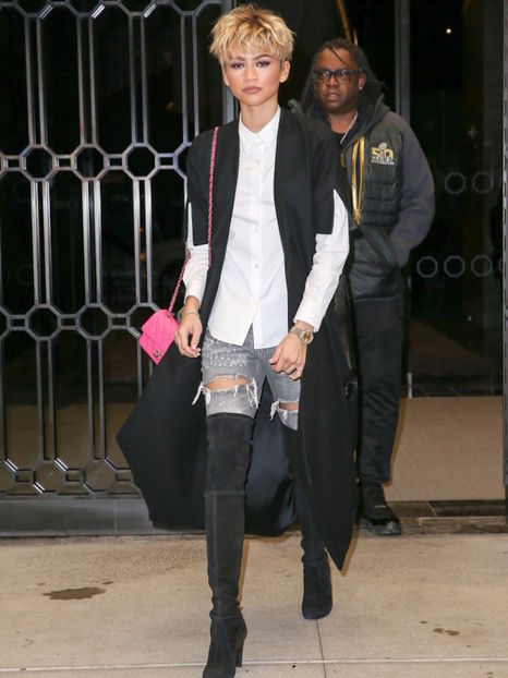 Fierce-Zendaya-looked-fab-mid-stride-in-NYC-dressed-in-a-white-shirt-ripped-jeans-standout-over-the-