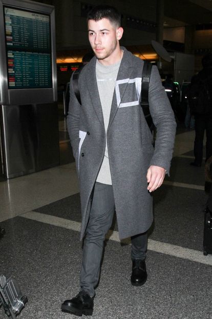 media.gq_.comphotos587b4e172aaff8d26115b768masterpassbest-dressed-men-1-14-16-nick-jonas-ddf62973e2b - nick jonas