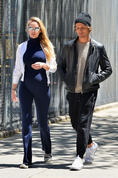 Candice-Swanepoel-shows-off-her-baby-boy-bump-in-an-all-blue-outfit-while-out-with-fiance-Hermann-Ni - candice swaneopel