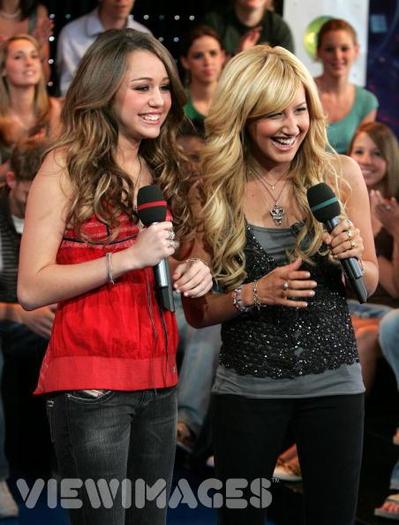 Ashley---Miley-ashley-tisdale-and-miley-cyrus-161974_452_594 - Ashley Tisdale and Miley Cyrus