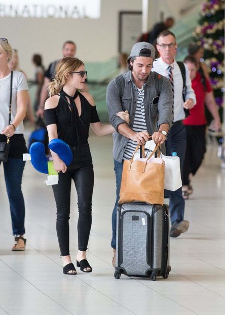 lucy-hale-and-anthony-kalabretta-at-airport-in-sydney-november-17-2016_119055004 - lucy hale