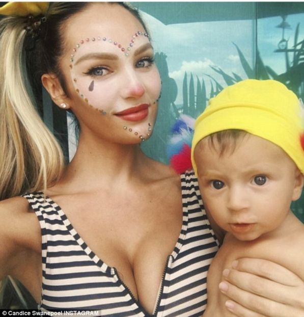 3DB7E8BB00000578-4262308-Carnival_Candice_Swanepoel_got_in_the_spirit_on_Sunday_as_she_an-a-164_1488 - candice swaneopel