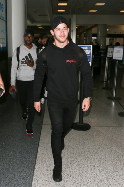 Nick+Jonas+is+seen+at+LAX+9QiWMDLDM15l - nick jonas