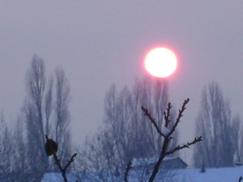 Apus de soare pe ger - Luna - Soarele si norii - 1