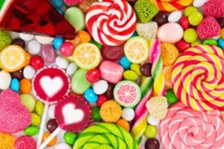 colorful-lollipops-different-colored-round-candy-top-view-85491170 - a-Hola amigos-a