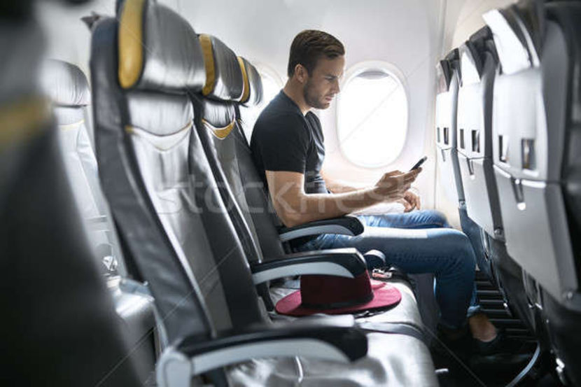 9132210_stock-photo-handsome-guy-in-airplane - Eu si poze cu mine