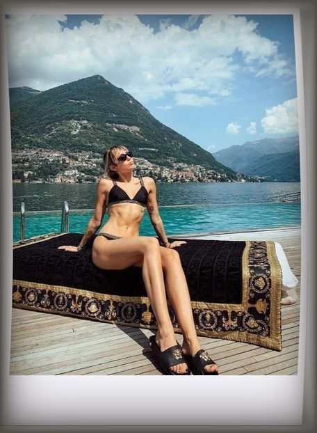 ˓1̣4̣ᵗʰ ტ.˒ Miley Cyrus shows off her tantalizing physique in Positano Spiaggia. - Memory is the diary we carry inside