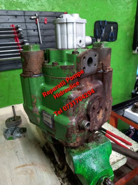 John Deree - Mentenanță Utilaje