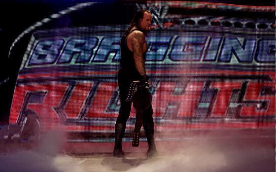 The-Undertaker-defeated-CM-Punk-Batista-and-Rey-Mysterio8 - poze noi wrestling