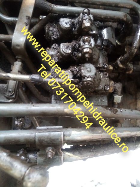 Reparatii Distribuitoare FORD , JOHN DEERE , NEW HOLLAND - Centru de reparatii DISTRIBUITOARE