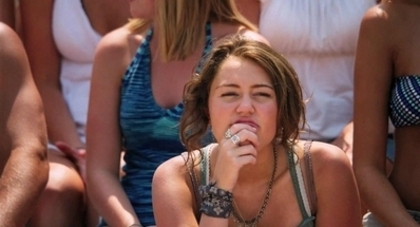 The-Last-Song-Trailer-miley-cyrus-9703400-398-215[1] - miley cyrus