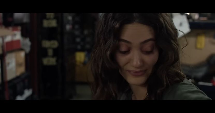 Janice eyes a wad of cash bound with a faded hospital tag. - The Devil is a Gentleman