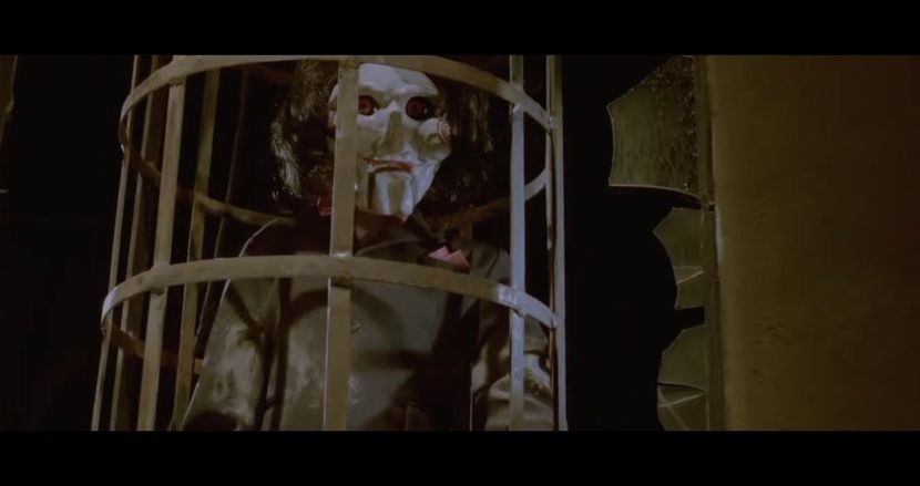 restraints extending outward like spokes of a wheel. Each restraint ends with a wrist shackle - The Devil is a Gentleman