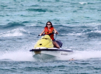 beachjetskiinbahamas130509-03 - Miley Cyrus