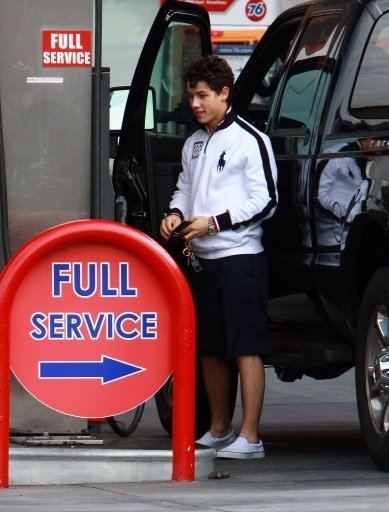 Out Pumpin gas - Nick Jonas pumping gas in LA