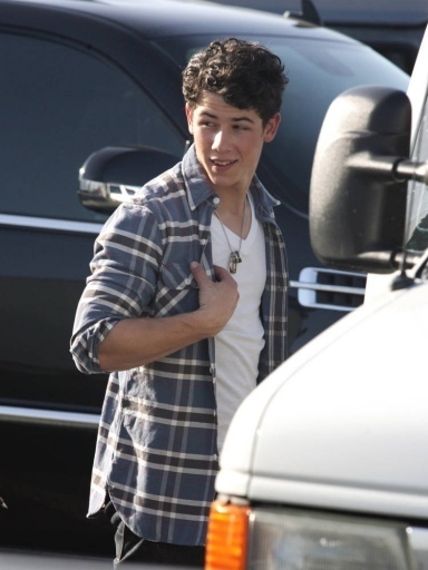 Out-on-the-set-of-JONAS-in-Santa-Monica-CA-2-17-nick-jonas-10490167-384-512 - Out on set of JONAS in Santa Monica