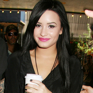 Demi%20Lovato%20performs%20at%20Atlantic%20City%20Needs%20Less%20Talking%20More%20Music[1]