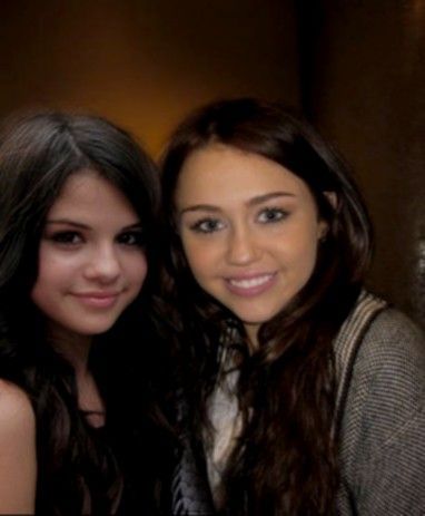 selena-miley-miley-cyrus-and-selena-gomez-10414950-382-463 - miley and selena