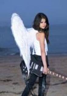 OCEOXPVYNVKANZSLRIZ - selena gomez