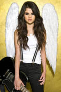 ZZYDGGUBJPIJOINBYYY[1] - selena gomez