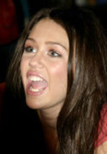 12763684_TTIXHRWHM - Hannah Montana Behind the Spotlight DVD Signing in London March 27 2007-00