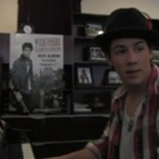 nick_jonas_celebrates_his_album_release_by_singing - Playing the song Poker Face-Lady Gaga