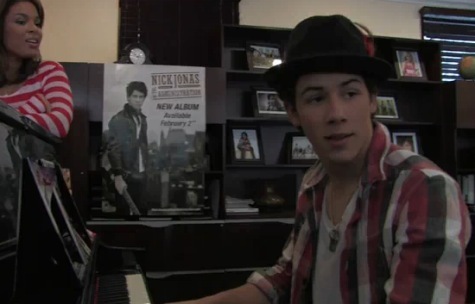 Nick-Jonas - Playing the song Poker Face-Lady Gaga